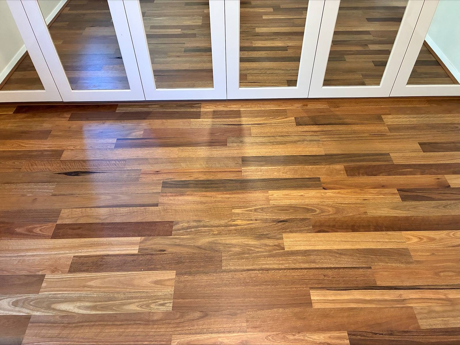 Spotted gum boards beneath plantation shutters