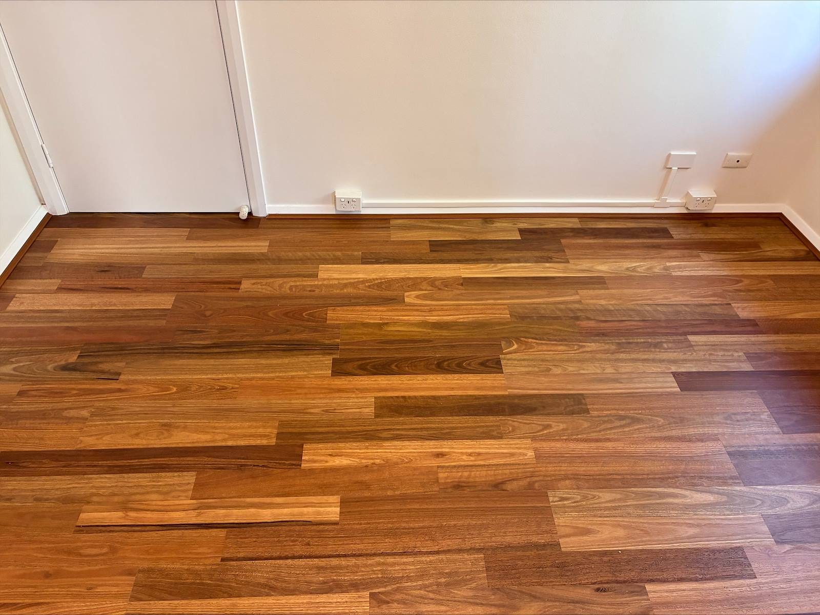 Rich spotted gum timber flooring in a living room